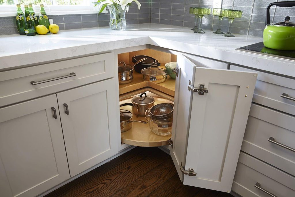 20 Types of Kitchen Cabinets 14 Corner kitchen cabinet featuring a rotating Lazy Susan storage system.